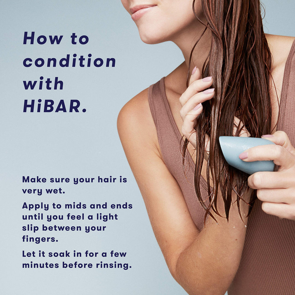 HIBAR Soothe Conditioner Bar on wet hair demonstrates detangling-ready use.