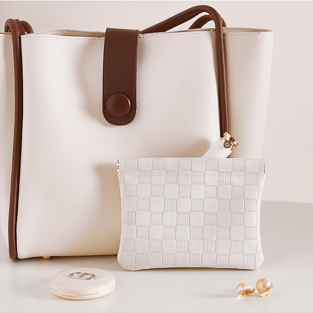 HIGH FIT gift-ready purse cosmetics bag suggests a stylish, practical present