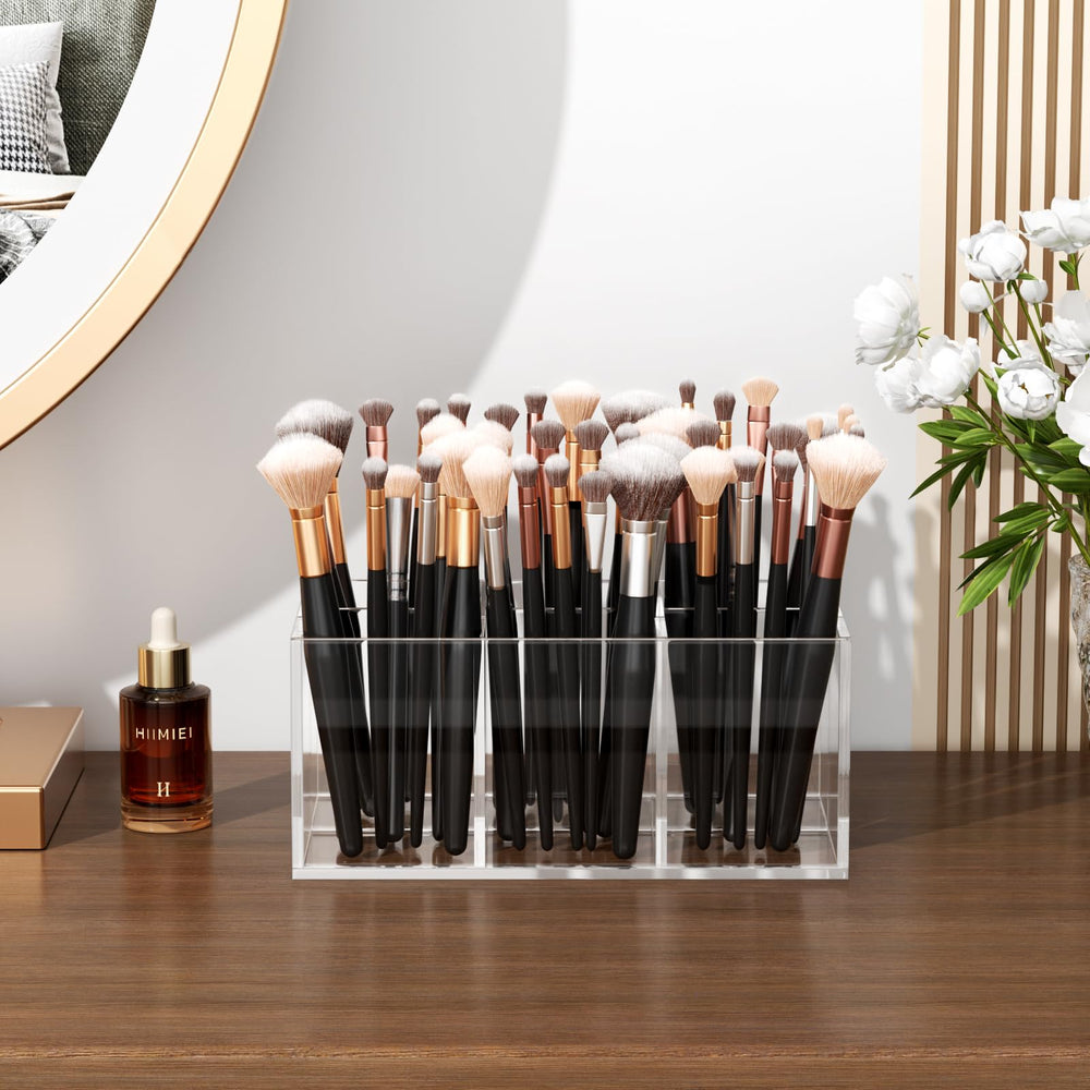 HIIMIEI makeup brush organizer in six compartments simplifies vanity organization and quick retrieval.