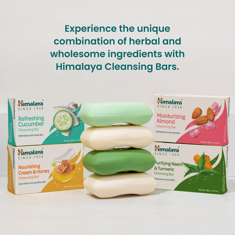 Himalaya cleansing bar on bath shelf with soft lighting.
