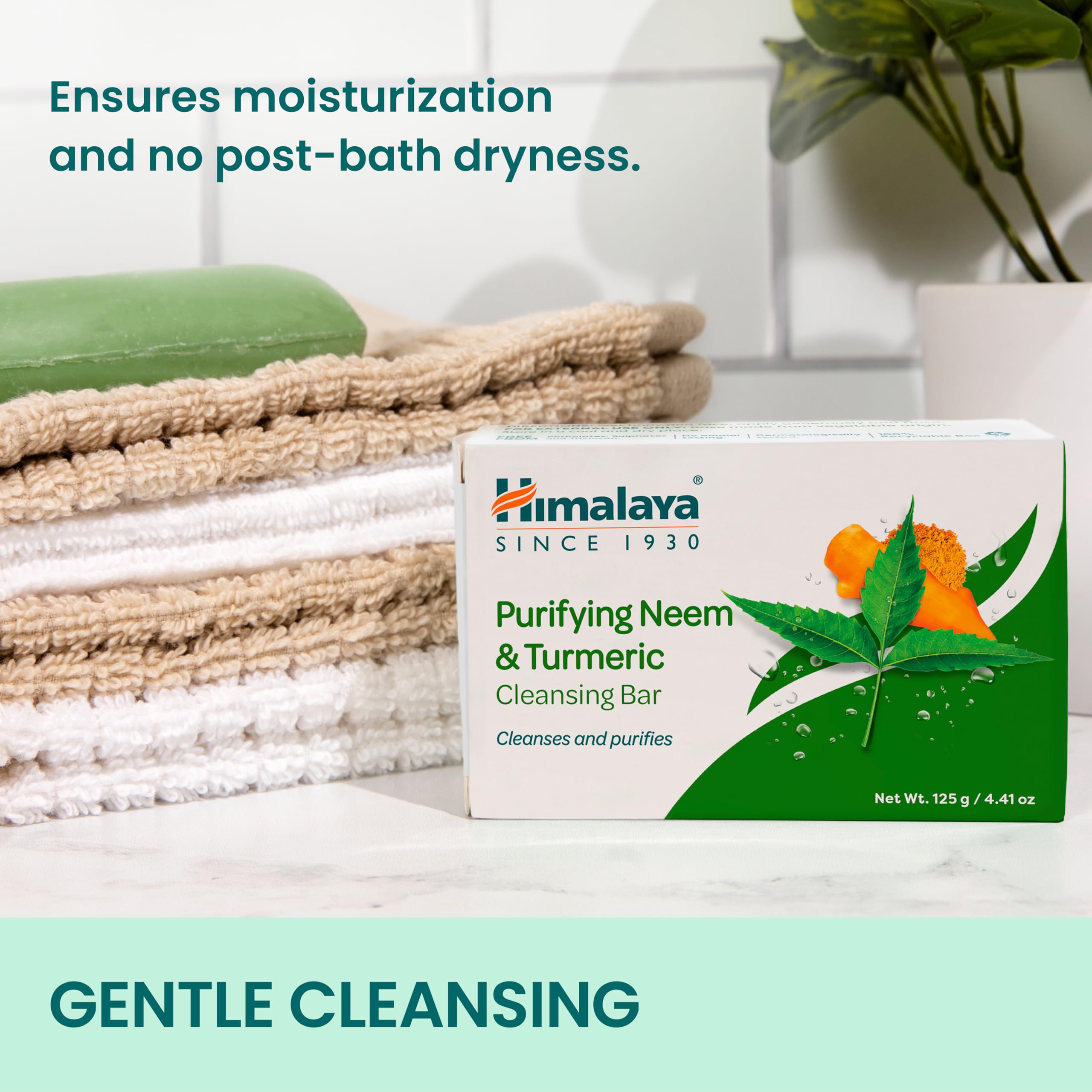 Himalaya neem-turmeric bar lather forming soft foam.