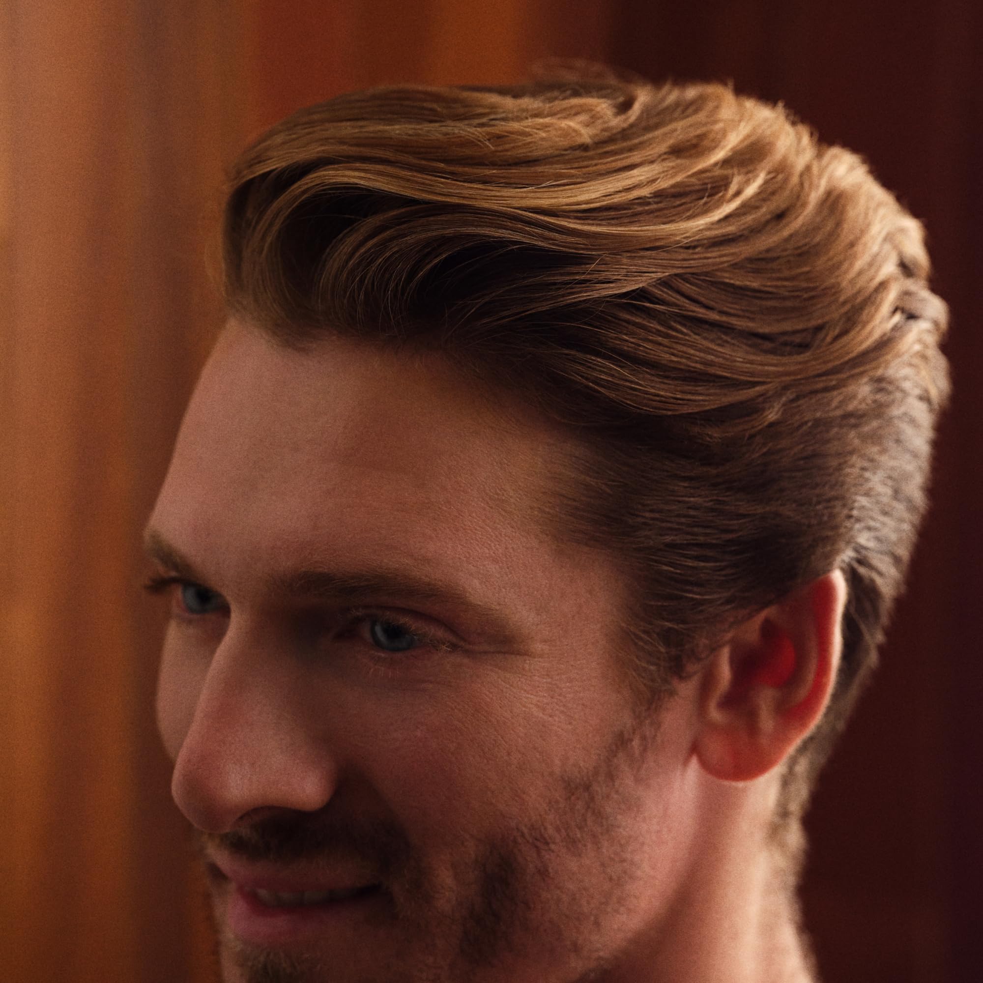Hims Thick Fix minoxidil serum bottle highlights 5% treatment for hair support.