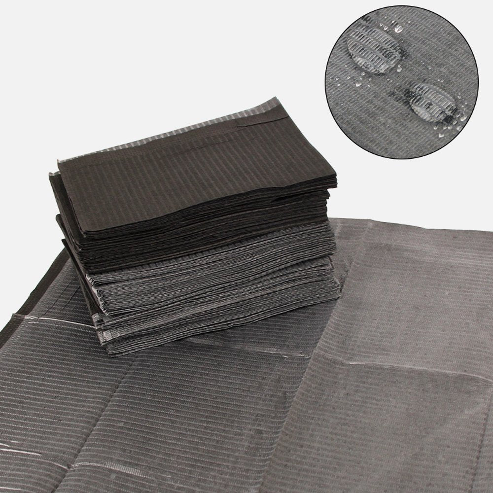Hisight black disposable dental bib hides stains while protecting clothing during procedures.
