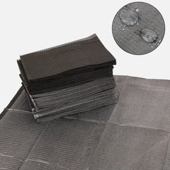 Hisight black disposable dental bib hides stains while protecting clothing during procedures.