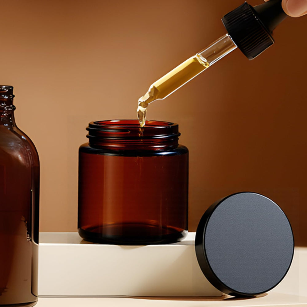 Hoa Kinh jars with black lids demonstrating airtight seal for salves and oils.