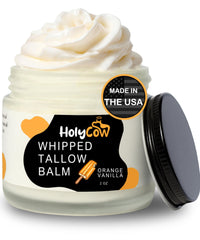 HolyCow Beef Tallow whipped balm bottle showing moisturizing application