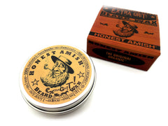 Honest Amish Extra Grit Beard Wax application displaying creamy texture for softening and conditioning.