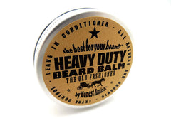 Honest Amish heavy-duty beard balm 2oz label close-up highlighting natural ingredients.