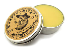 Honest Amish beard wax taming rogue hairs for a controlled look.