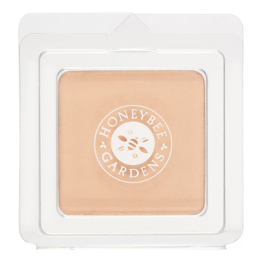 Honeybee Gardens pressed mineral powder refill in luminous shade ready for on-the-go touch-ups