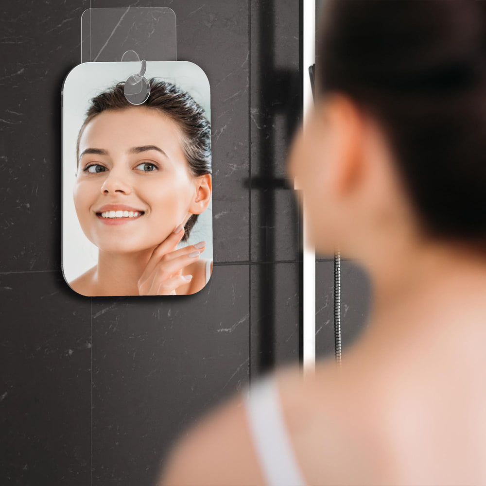 HONEYBULL mirror with razor hook keeps grooming tools within easy reach.