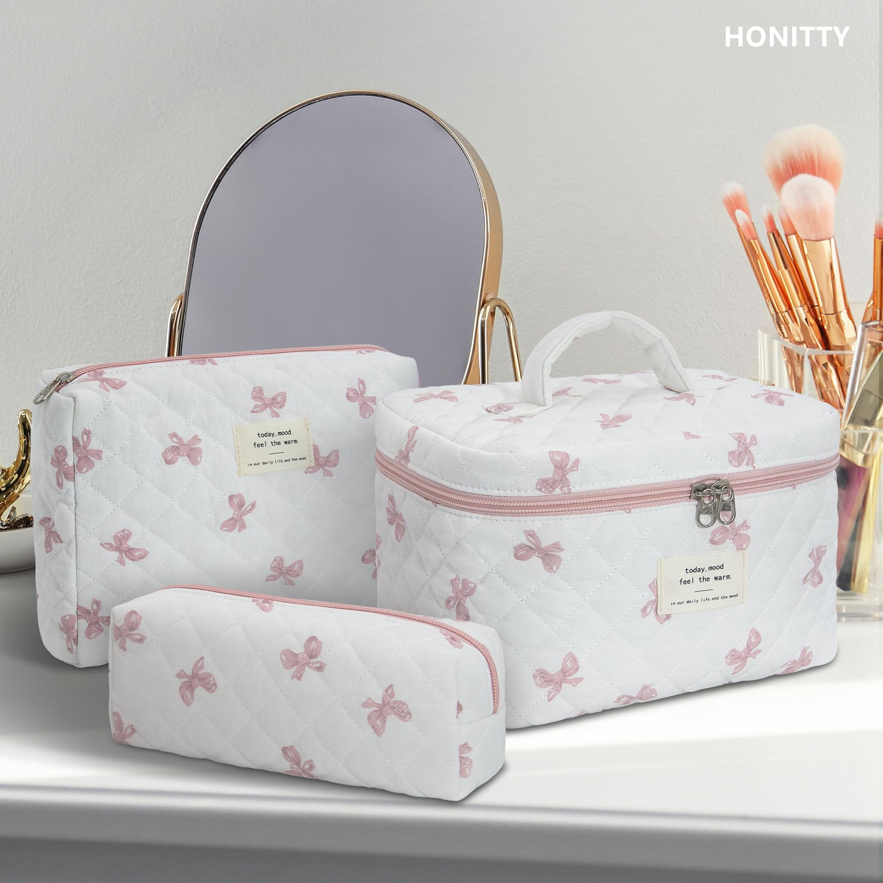 Honitty floral design bag easy-clean surface, helping keep cosmetics and toiletries tidy after travel.
