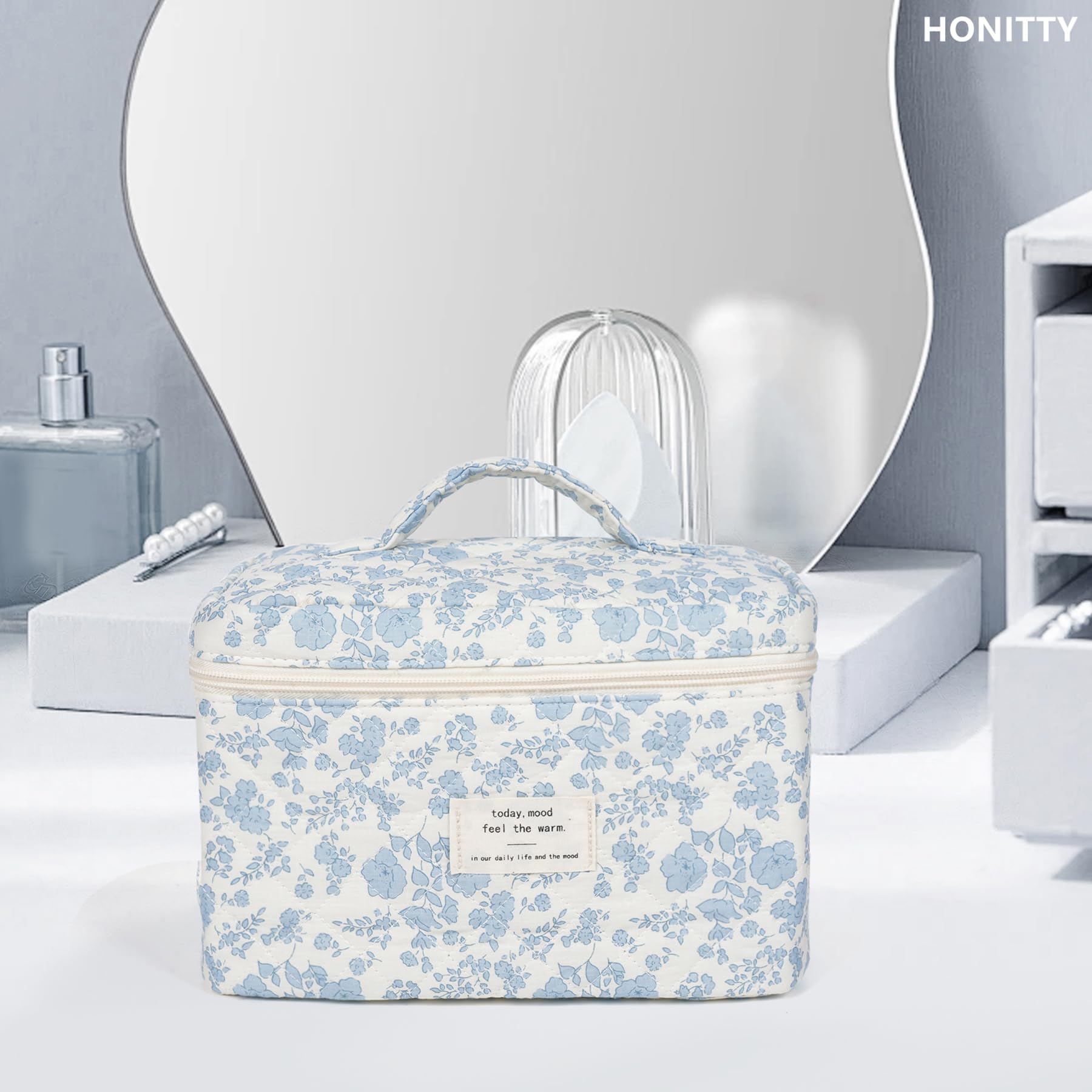 Honitty makeup bag with durable fabric and smooth zipper for long-lasting travel use.