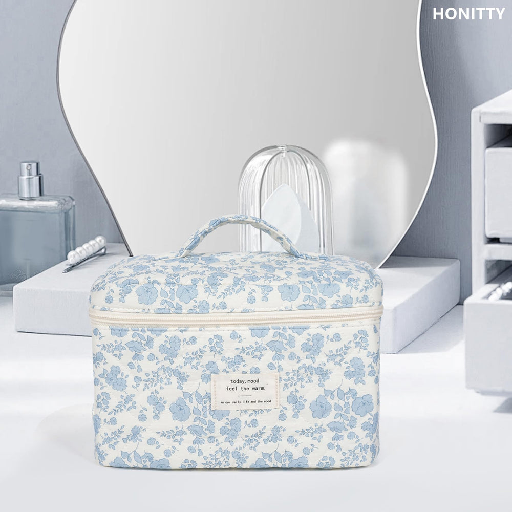 Honitty makeup bag with durable fabric and smooth zipper for long-lasting travel use.