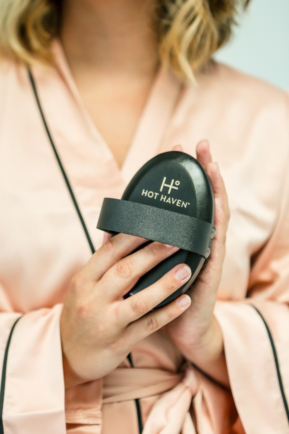 HOT HAVEN Copper-bristle brush shown in a morning routine for circulation support