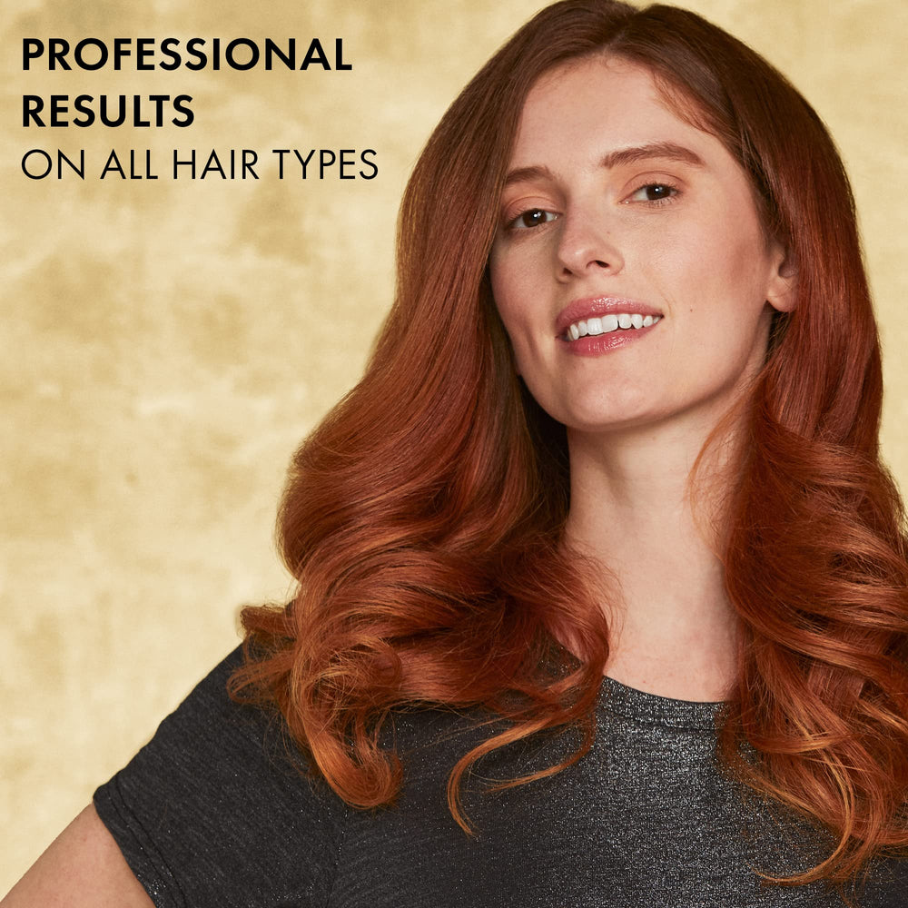 Hot Tools 24K Gold digital curling iron side view demonstrates ergonomic soft-touch handle.