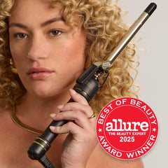 HOT TOOLS 24K Gold curling iron clamp in action styling smooth ringlets