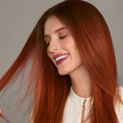 HOT TOOLS Pro Artist Black Gold Ionic flat iron with rounded edges for smooth, shiny results.