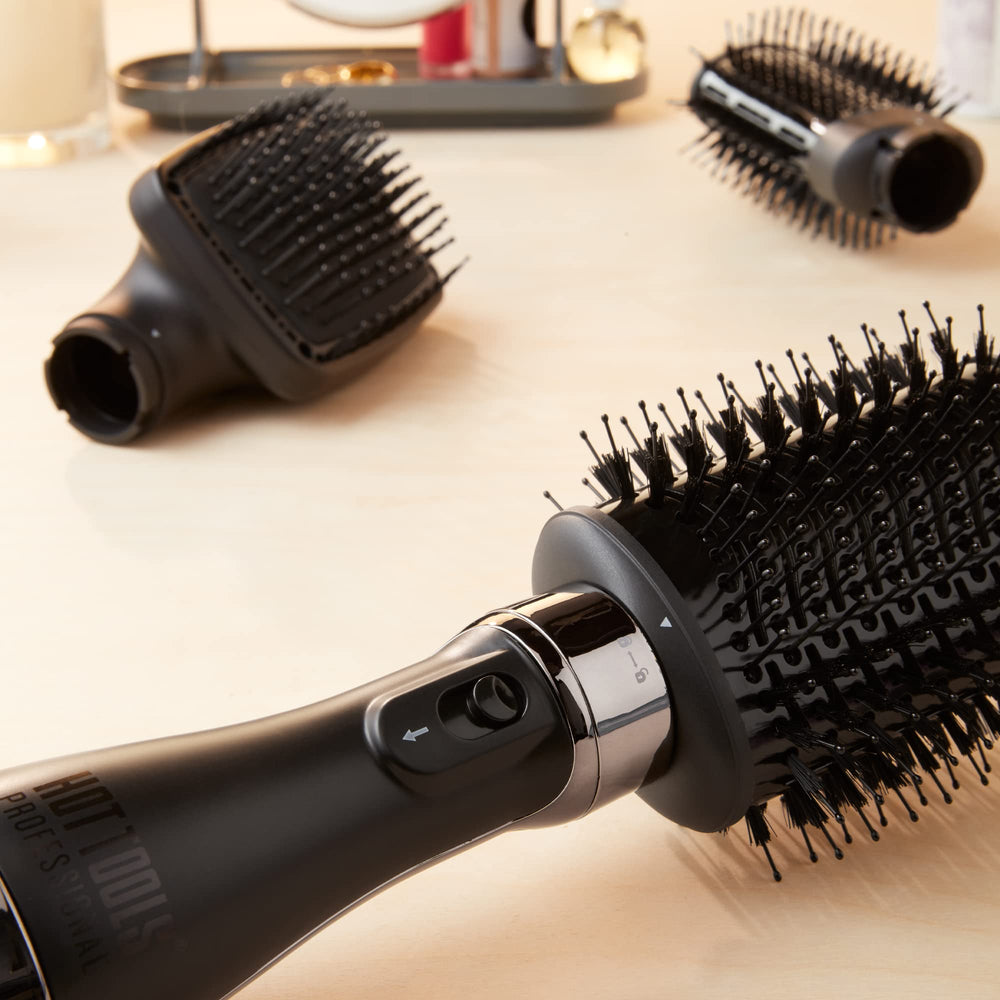 Hot Tools Pro Artist Black Gold smoothing ion technology reduces frizz during styling.