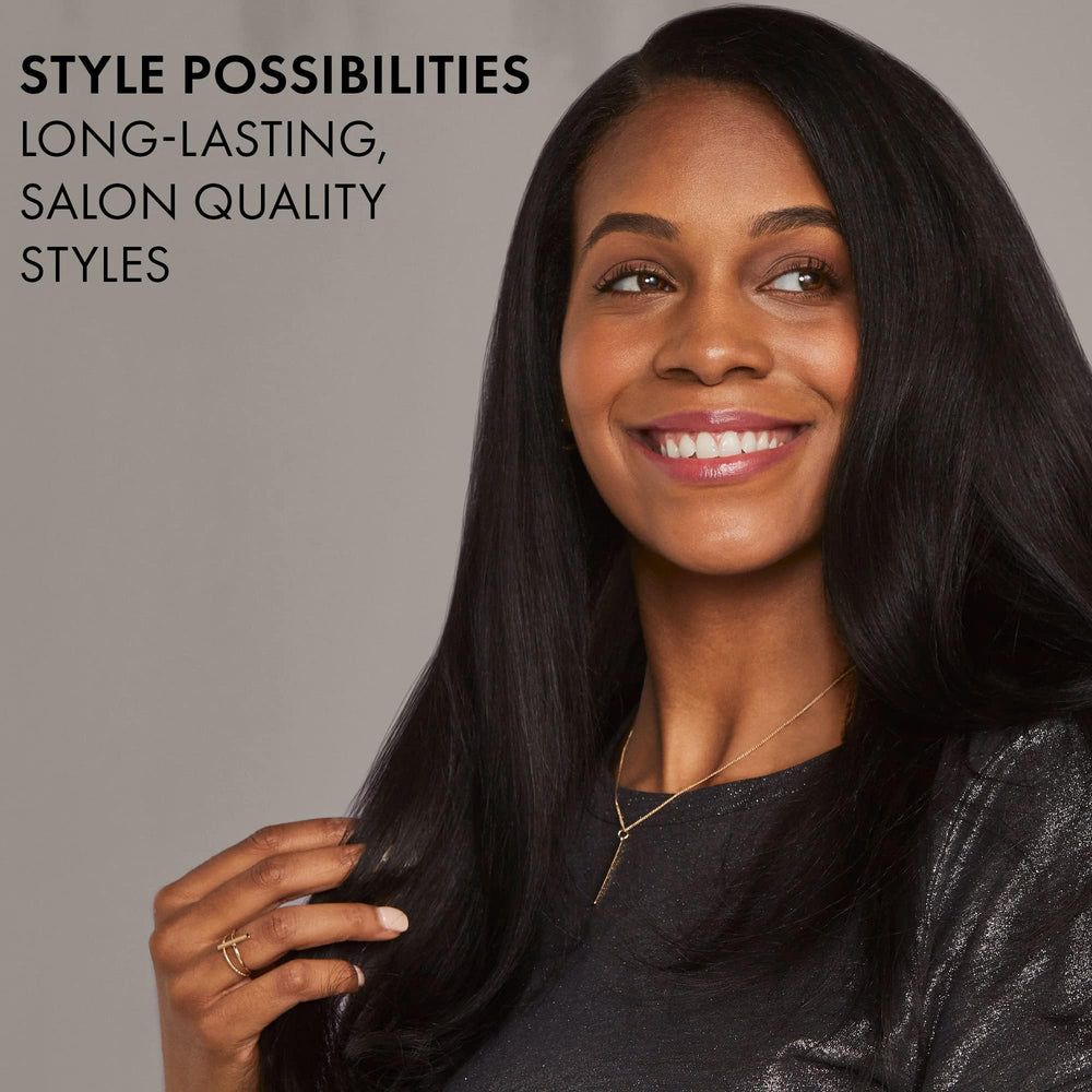 Hot Tools Pro Artist Oval Brush showcases a glossy Black Gold finish for premium feel and smooth glide.