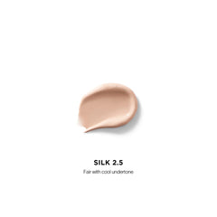 Hourglass Vanish Airbrush Concealer applicator—precise control for even coverage.
