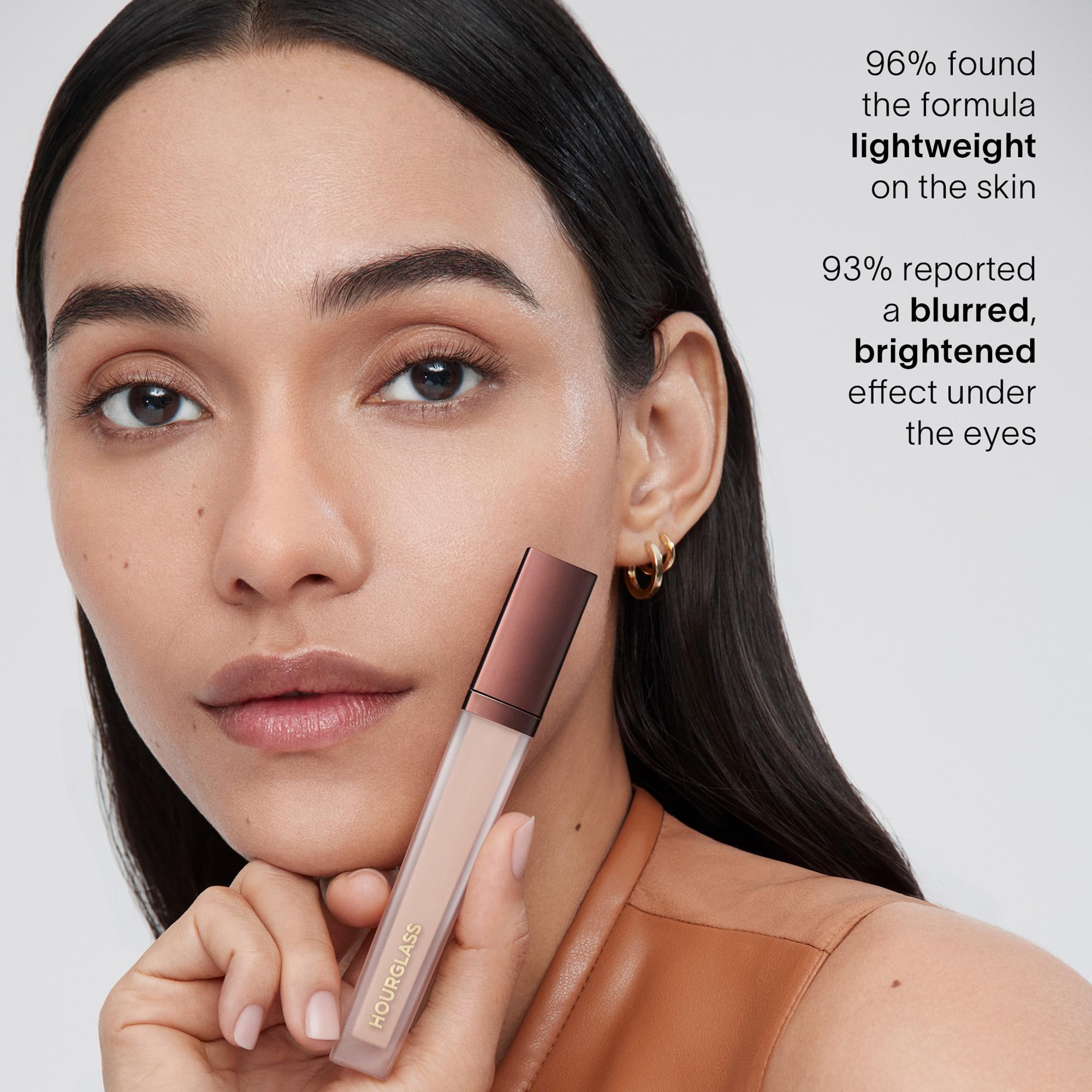 Hourglass Vanish Airbrush Concealer natural finish appears undetectable on complexion.
