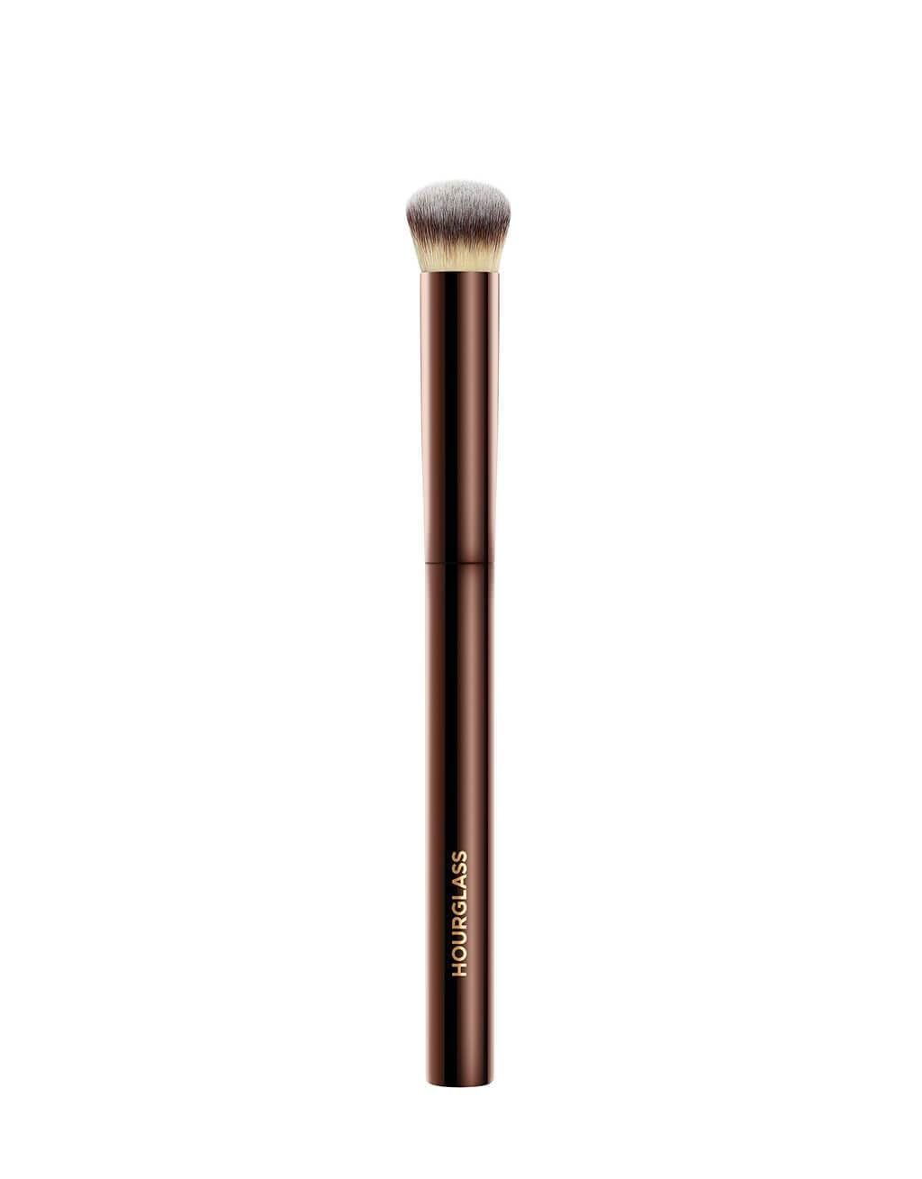 Hourglass Vanish brush half-moon bristles for precise, seamless blending with liquids and creams