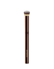 Hourglass Vanish brush half-moon bristles for precise, seamless blending with liquids and creams