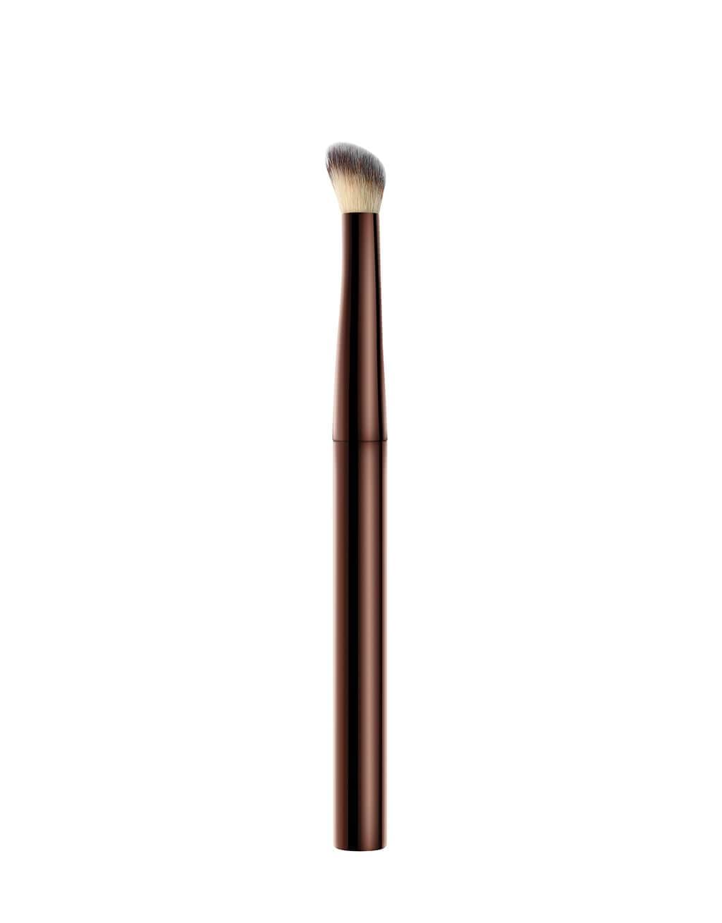 Hourglass Vanish brush with weighted metal handle delivers pro-level control