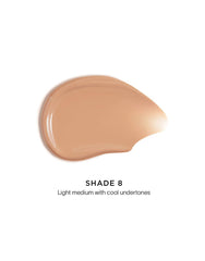 Hourglass Veil Hydrating Skin Tint bottle closeup emphasizes lightweight, breathable wear.