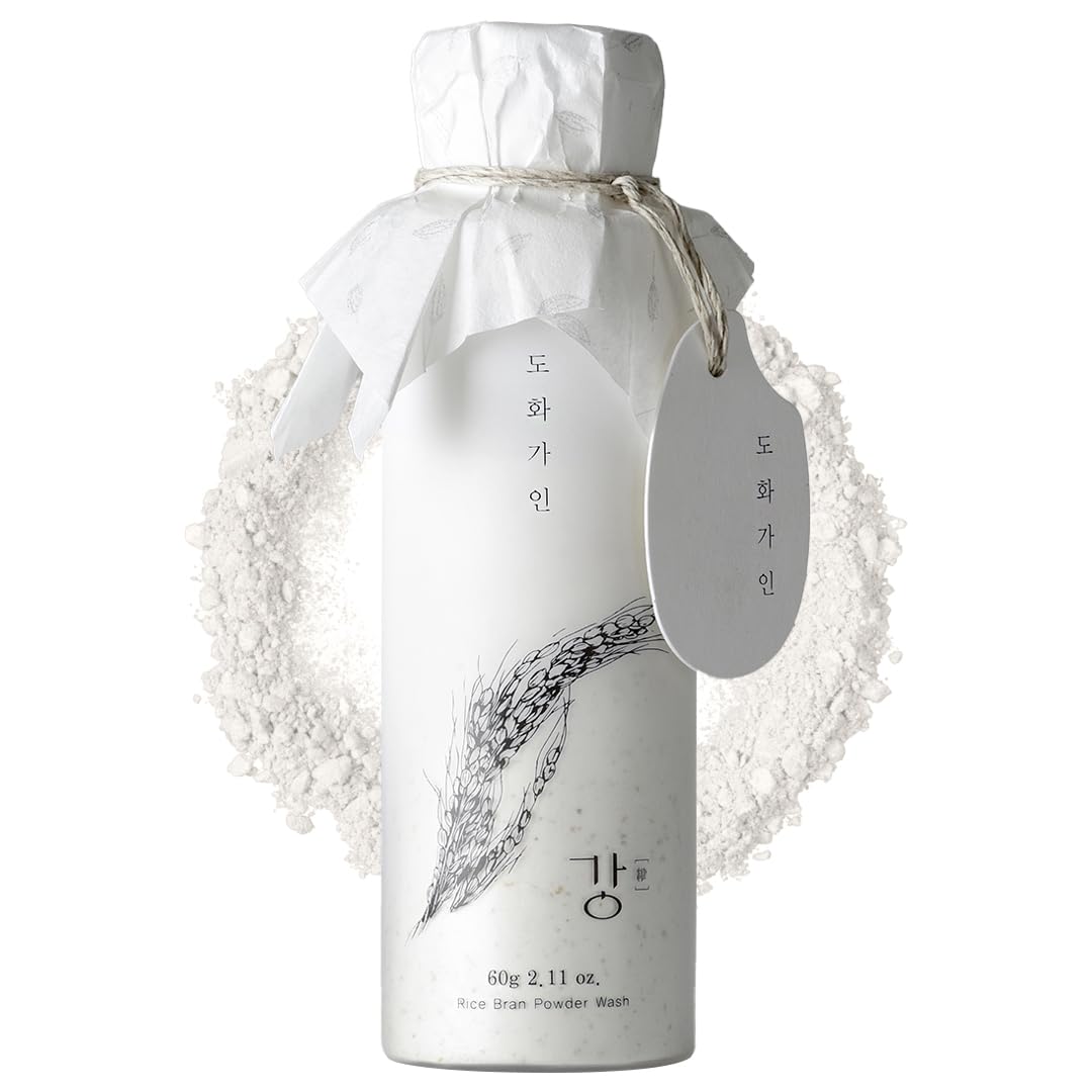 House of Dohwa Rice Bran Powder Wash label closeup, signaling gentle exfoliation for refined skin