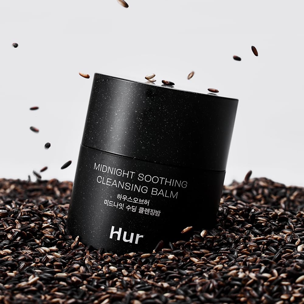 House of Hur Midnight Cleansing Balm being massaged into skin during application ritual.