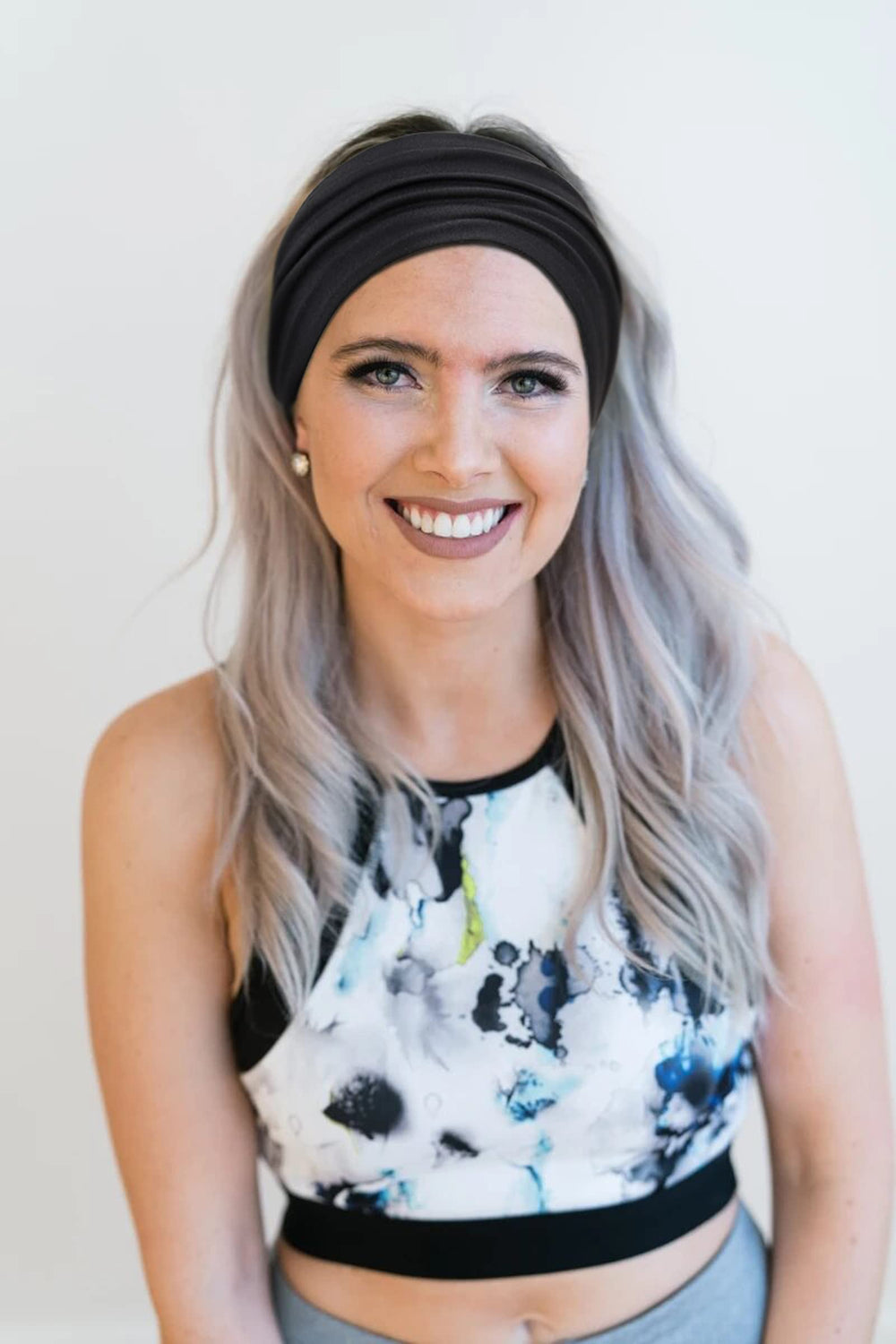 Huachi headband worn during yoga or exercise enhances focus by keeping hair away.