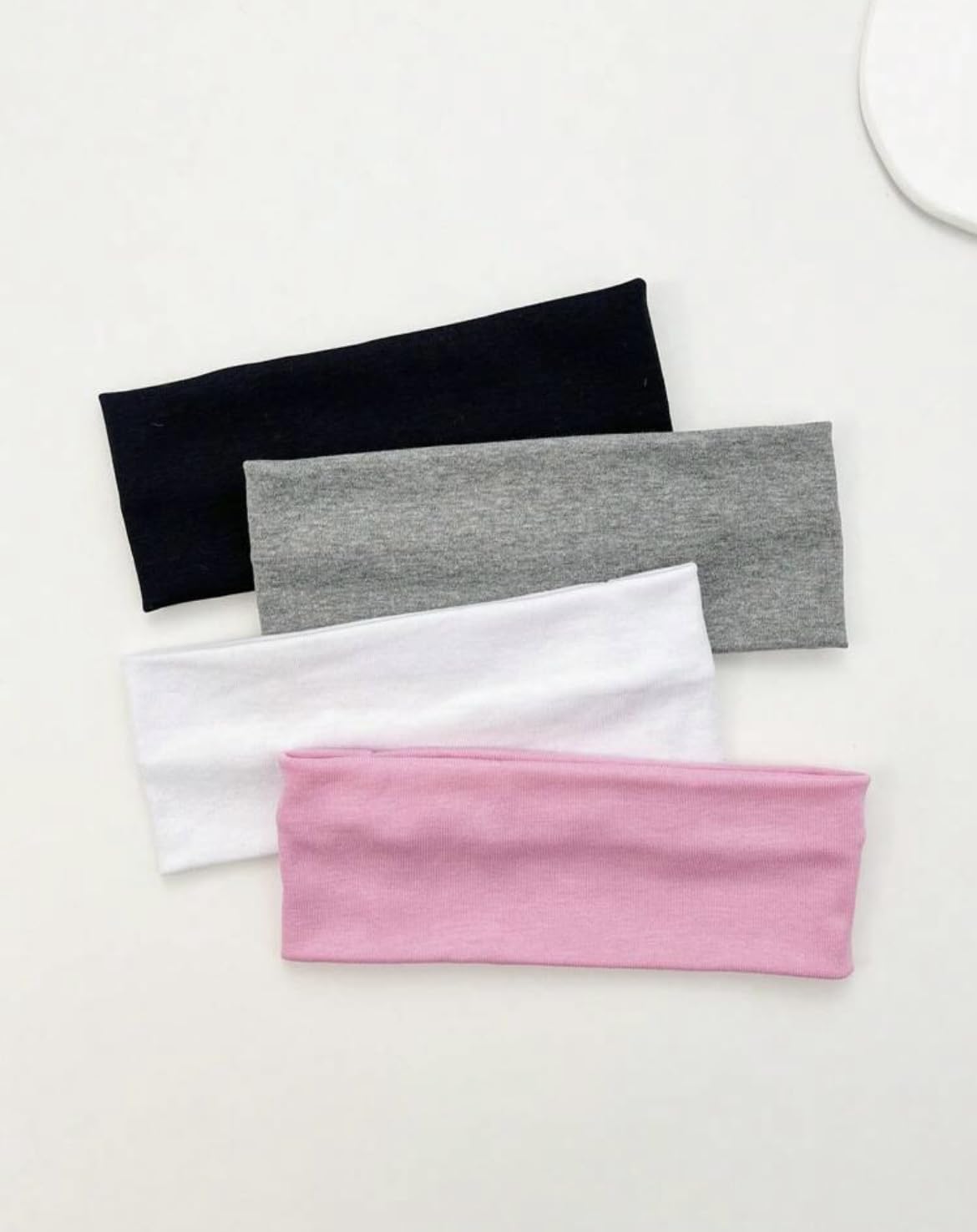Huachi headbands women non-slip design demonstrated for secure fit during workouts.