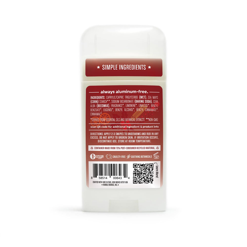 Label highlights Sweet Orange and Cinnamon scent for cozy seasonal appeal.