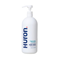 Huron Men's Moisturizing Body Wash bottle pour with Crisp Citrus scent for an energizing start