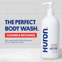 Huron Men’s Body Wash hand lather demonstrates rich foam for an energizing morning routine.