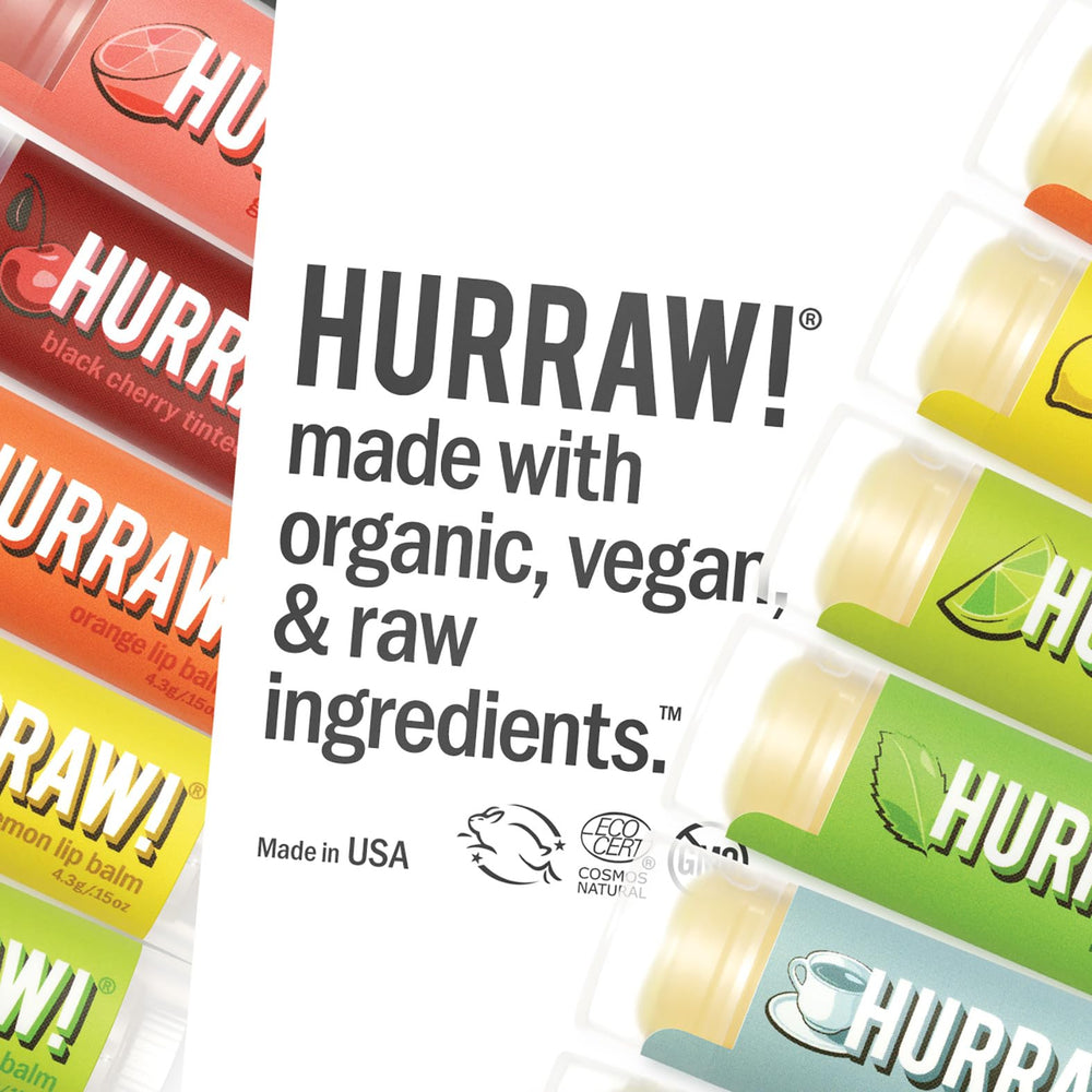 Application moment of Hurraw Coconut Lip Balm gliding onto lips for moisture.