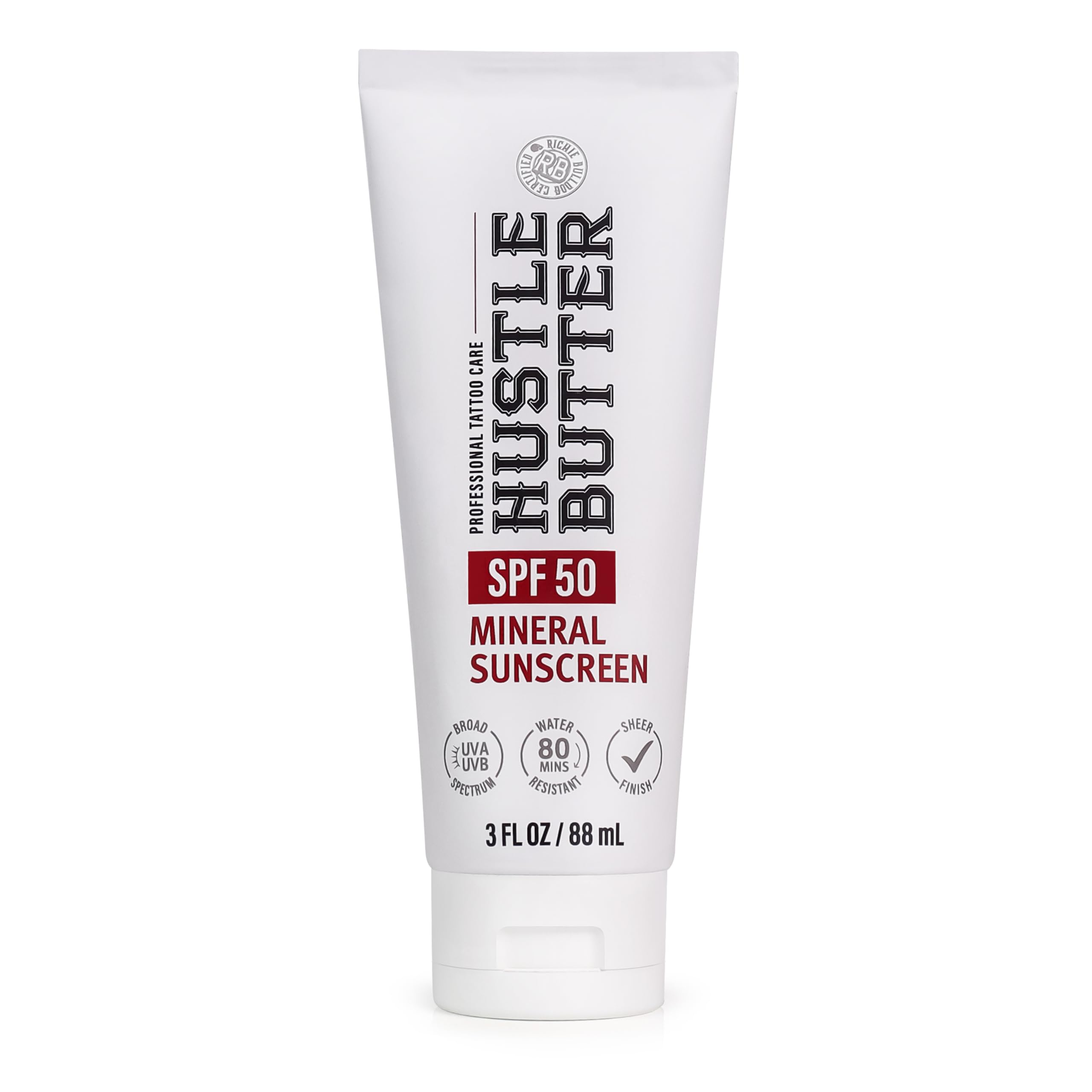 Hustle Butter Deluxe tattoo sunscreen bottle closeup with SPF 50 protection for ink