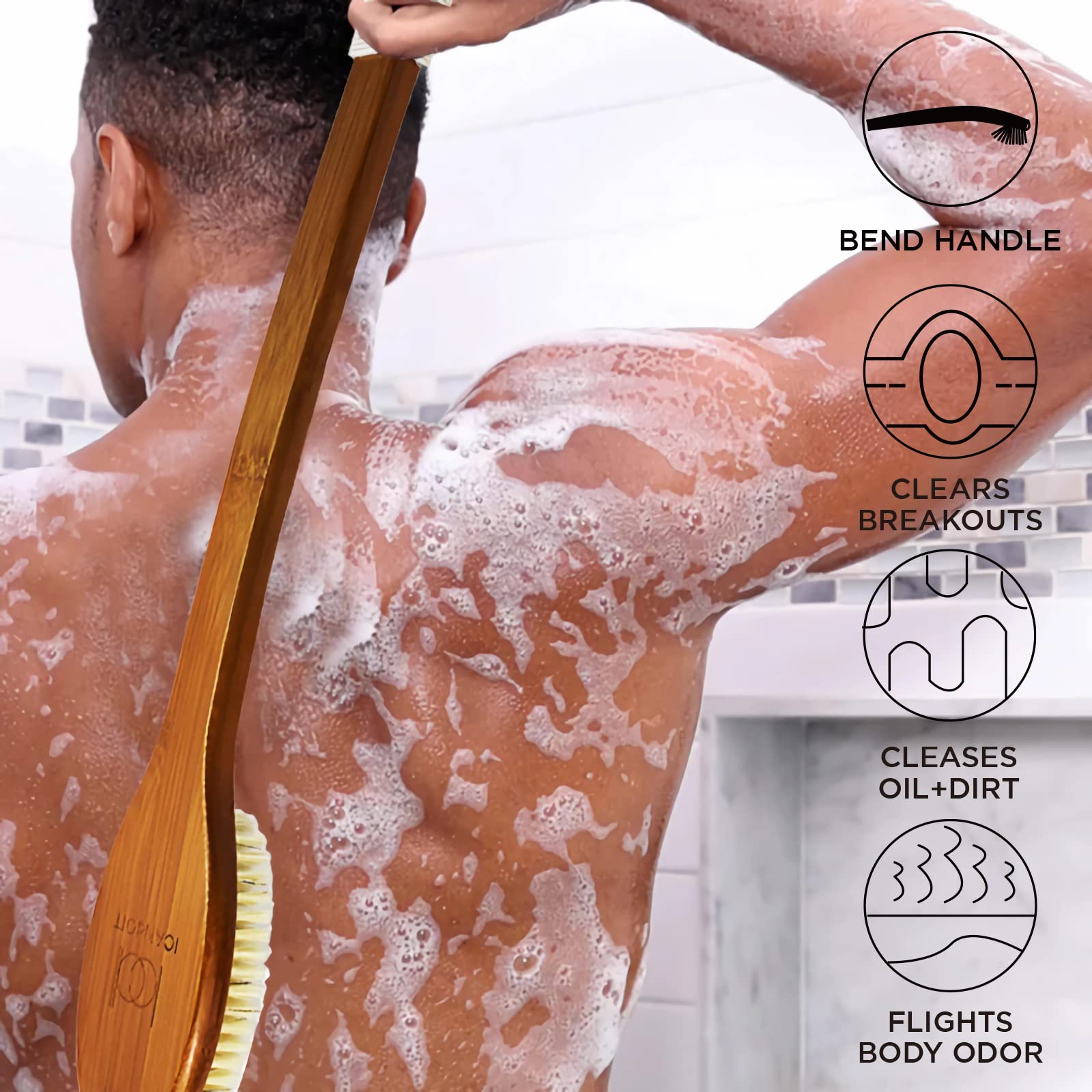 ICANdOIT bent-handle shower scrubber showing extended reach to clean the back.