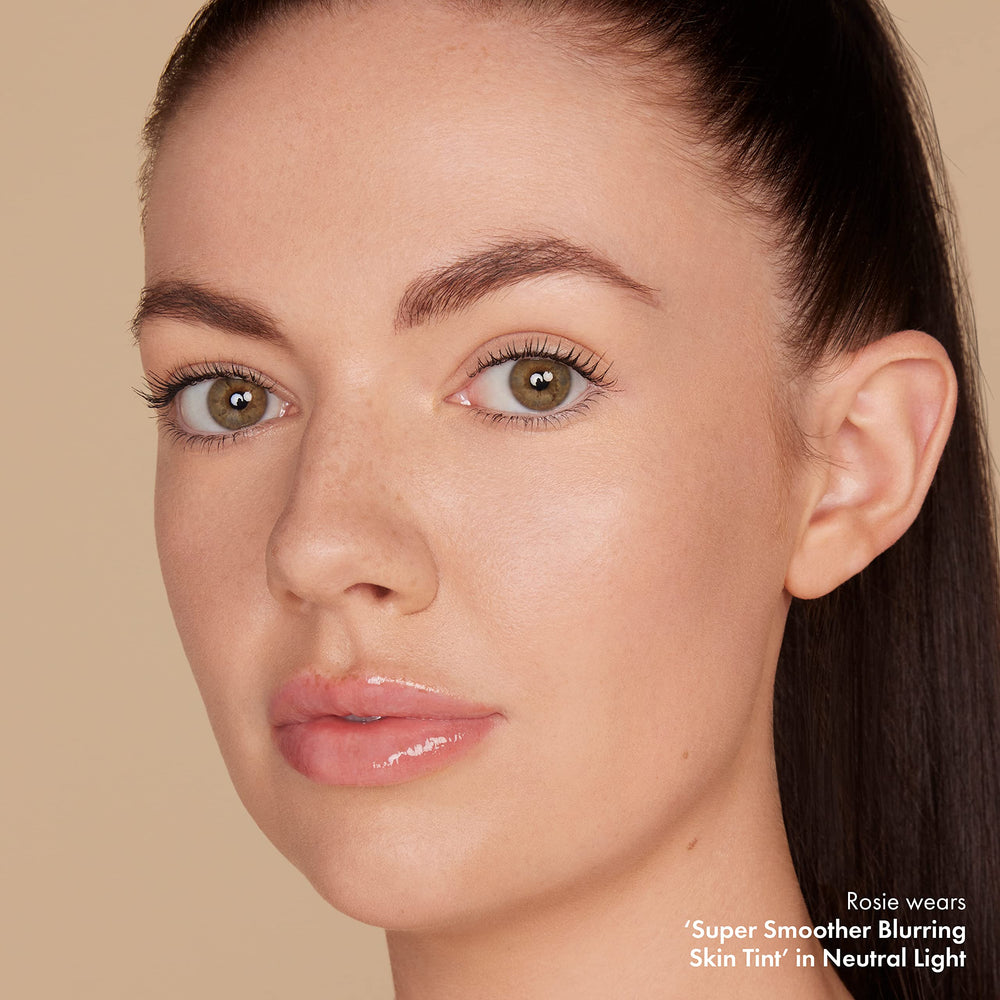 ICONIC LONDON Super Smoother ingredients closeup highlights Peach Flower and Pea extracts.
