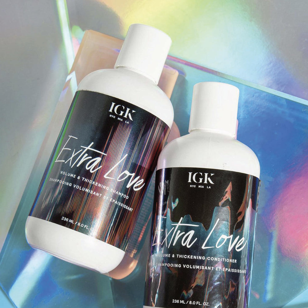 IGK Extra Love hair finish close-up reveals glossy, bouncy strands.