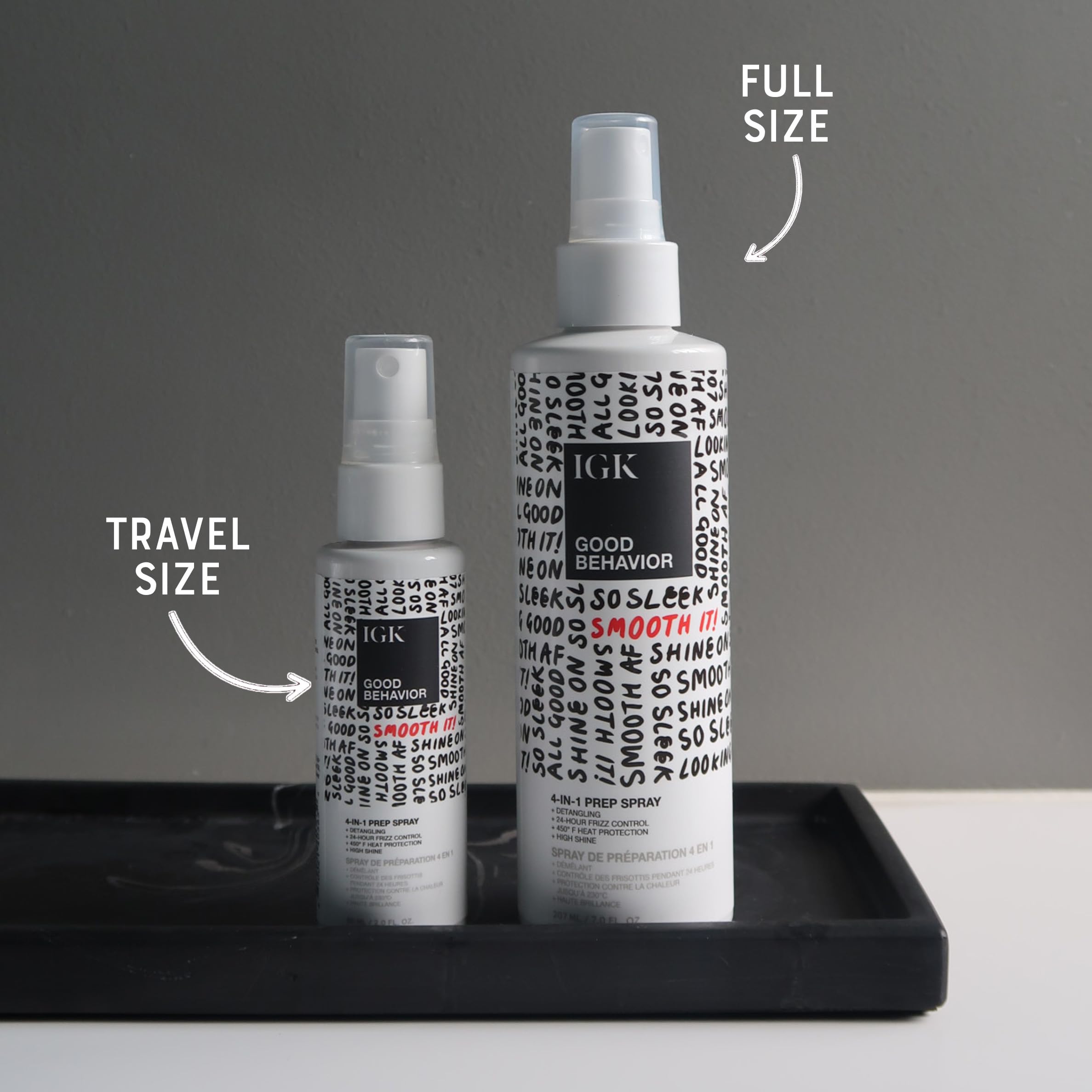 IGK Good Behavior 4-in-1 Prep Spray bottle front for weightless shine and heat protection.