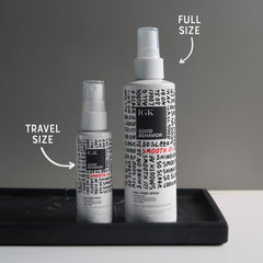 IGK Good Behavior 4-in-1 Prep Spray bottle front for weightless shine and heat protection.