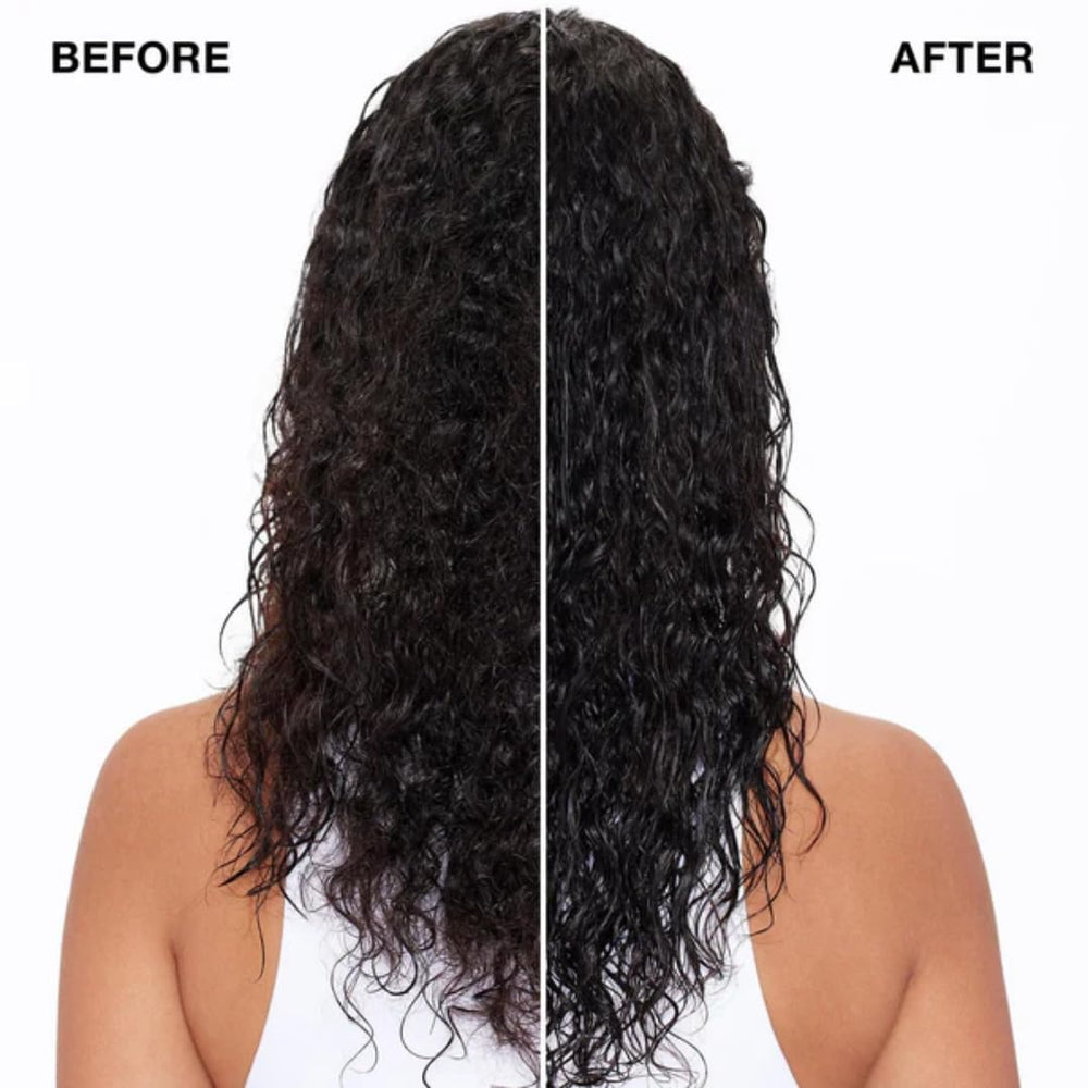 IGK Good Behavior 4-in-1 Prep Spray mist demonstrates even application for smoother blowouts.