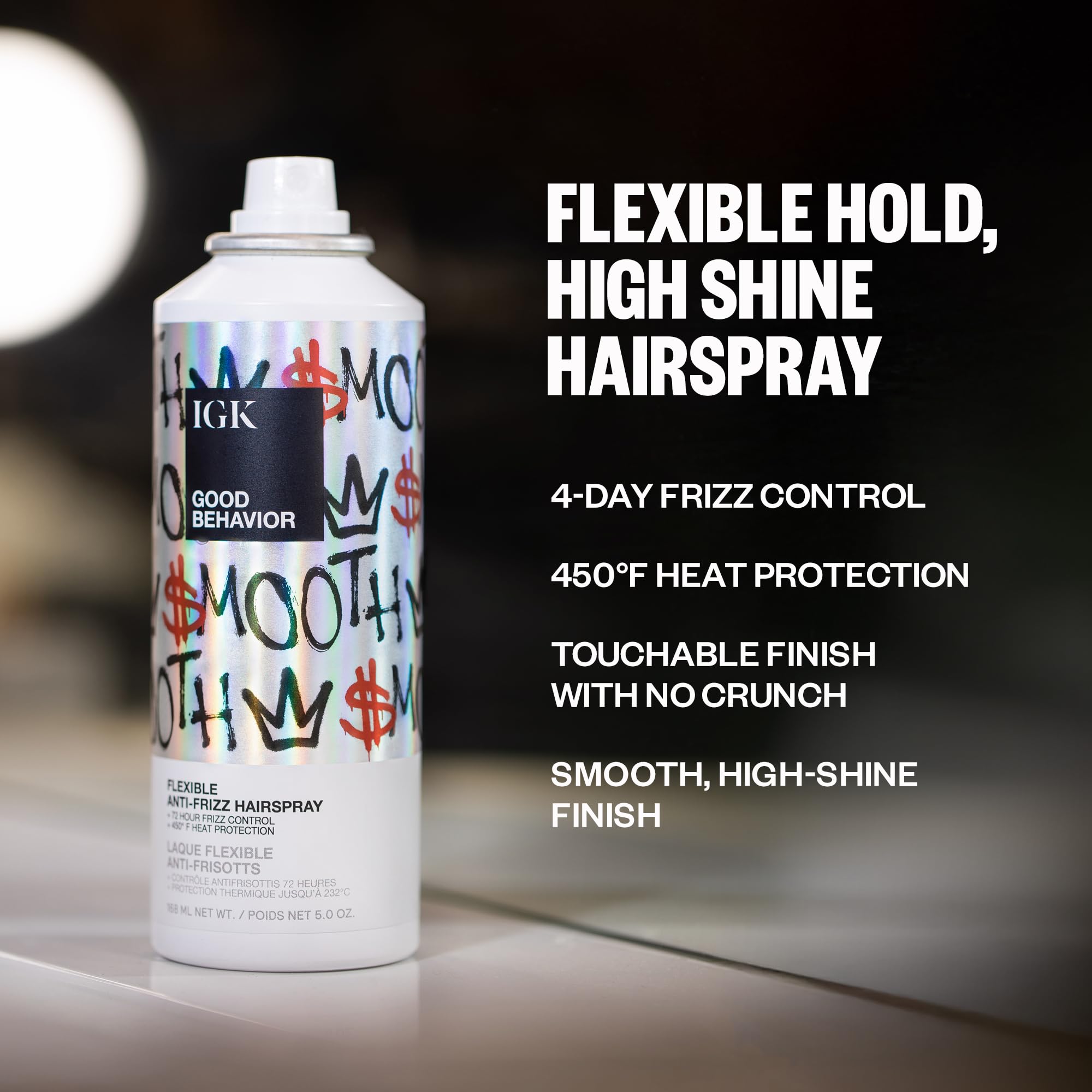 IGK Good Behavior hairspray dispense shot shows even mist for brushable hold