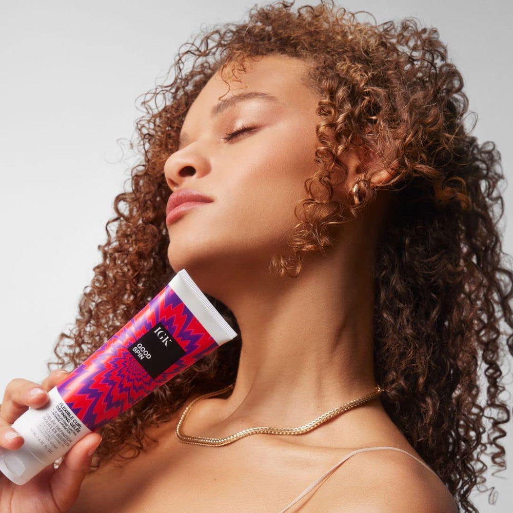 IGK Good Spin oat milk close-up shows nourishment for smooth curls