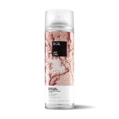 IGK Jet Lag bottle pour demonstrates lightweight cleansing for refreshed roots