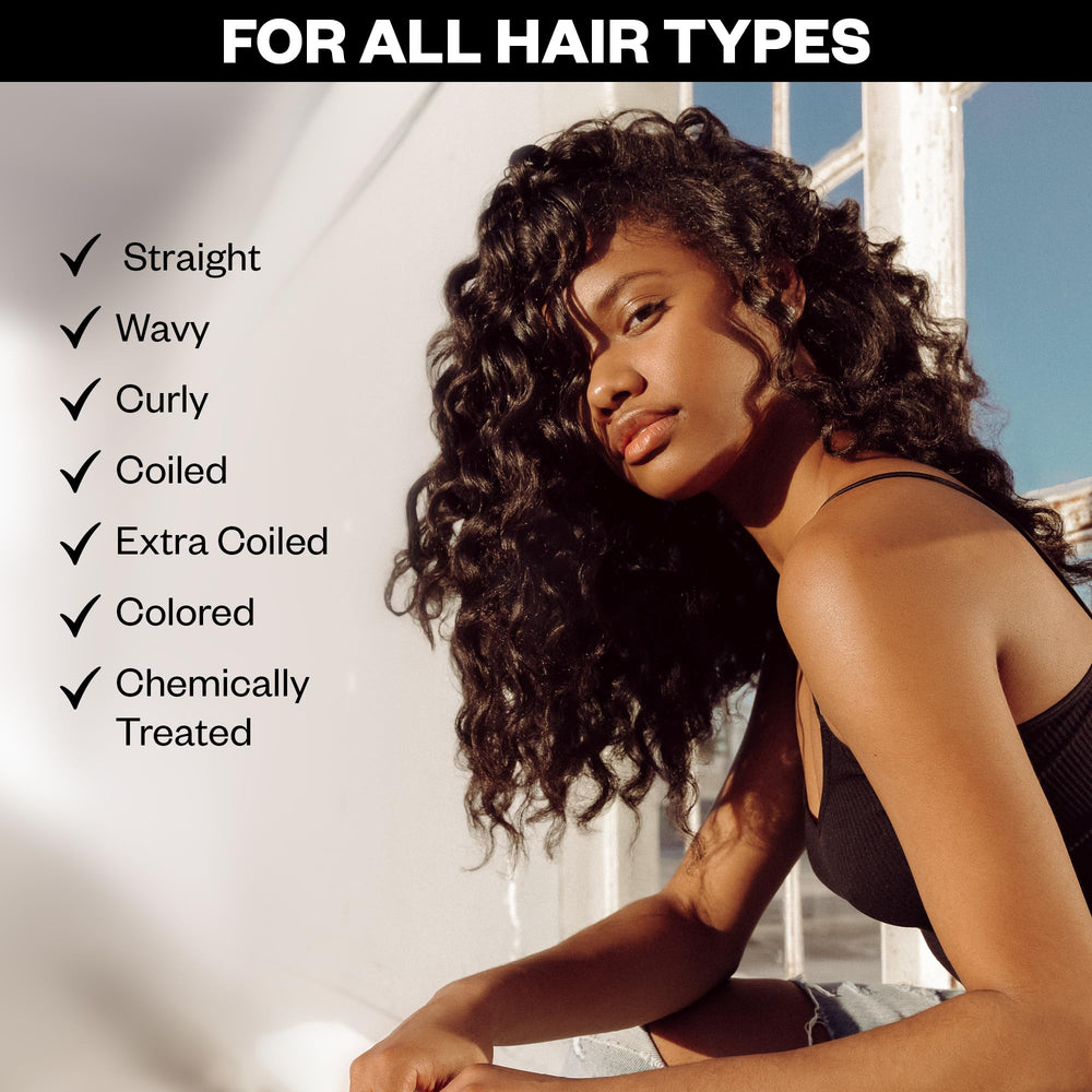 IGK Mistress on curly hair shows defined frizz control and bounce.