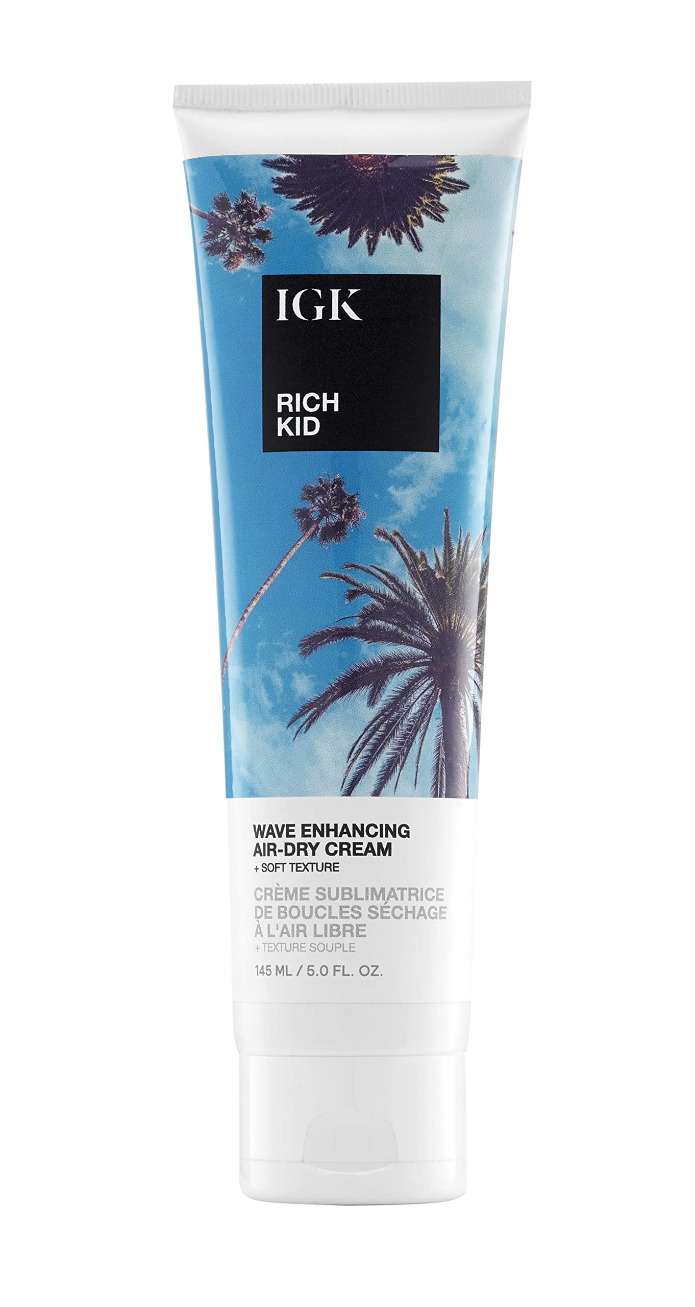 IGK Rich Kid bottle standup shows easy, portable styling for on-the-go hair care.